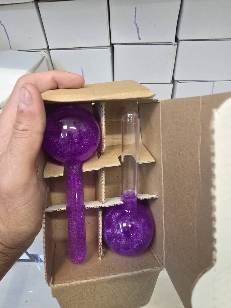 ماساژور صورت گوی یخی بنفش بسته ۲ عددی نشکن شیشه ای ماساژور صورت گوی یخی بنفش بسته ۲ عددی نشکن شیشه ای